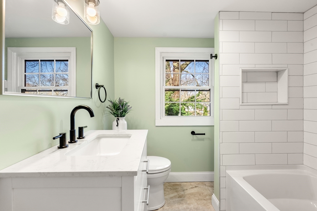 48 Beeler Avenue Chicopee, MA 01020 - Photo 22 of 30 a bathroom with a sink a toilet and shower