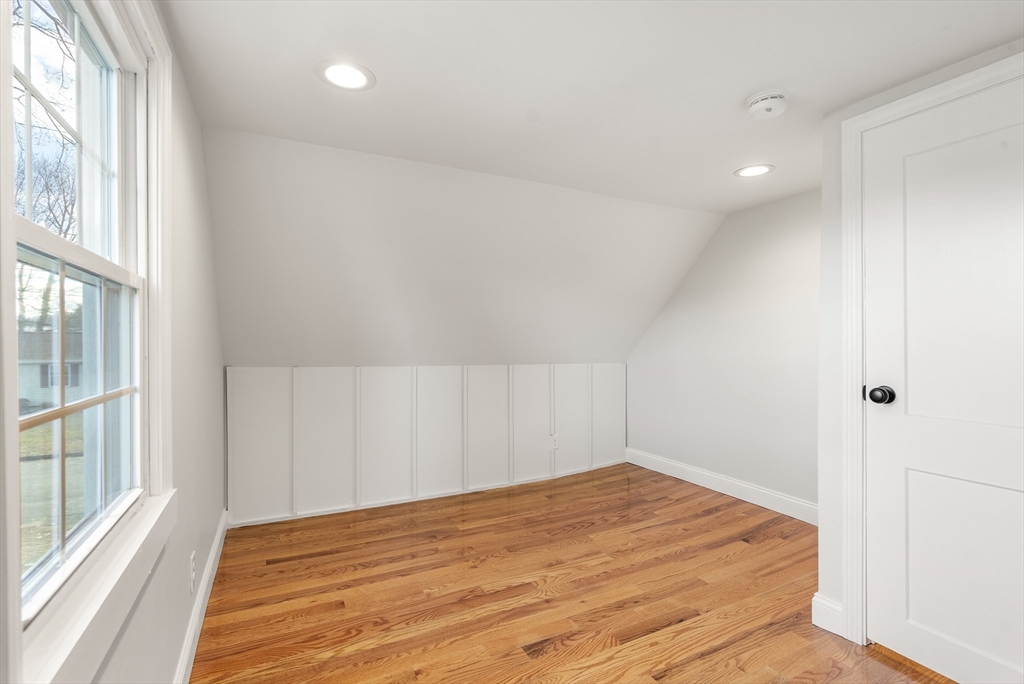 48 Beeler Avenue Chicopee, MA 01020 - Photo 23 of 30 a view of empty room with wooden floor and fan