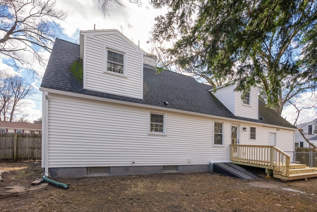 48 Beeler Avenue Chicopee, MA 01020 - Photo 29 of 30 a view of a white house with a yard and sitting area