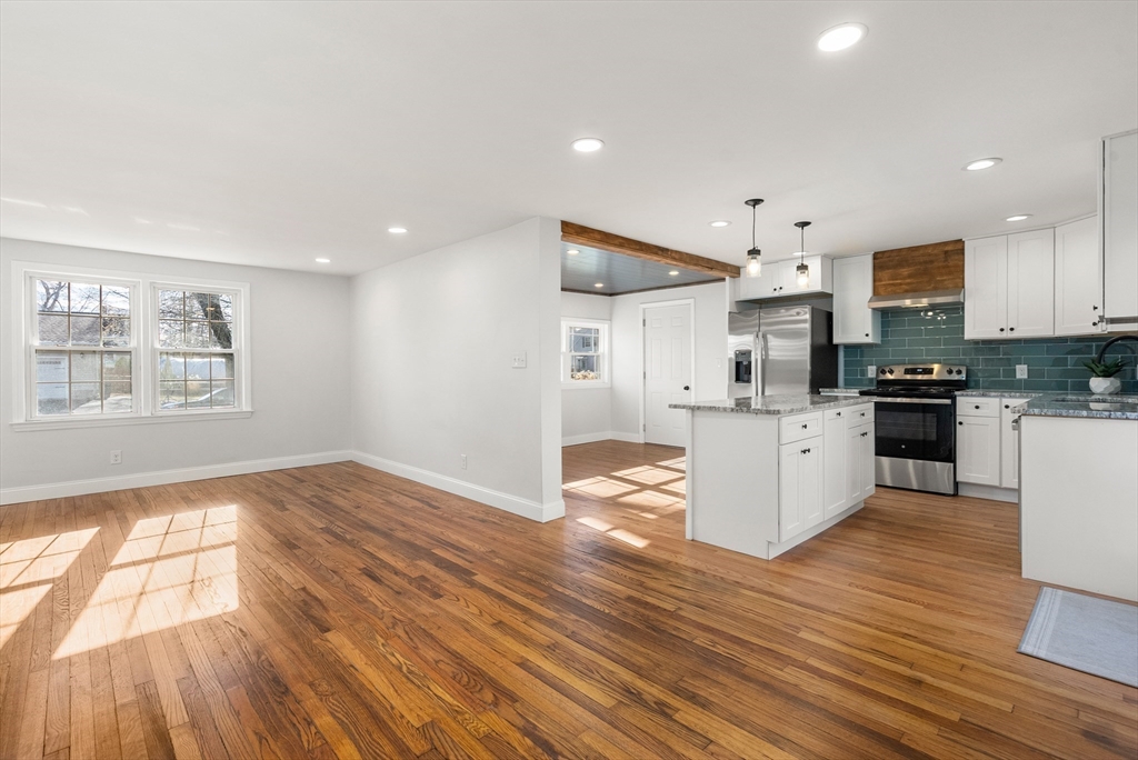 48 Beeler Avenue Chicopee, MA 01020 - Photo 9 of 30 a view of kitchen with wooden floor and electronic appliances