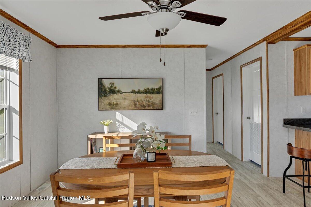 299 Hyspot Road, Unit 4C Greenfield, NY 12833 - Photo 14 of 41 a view of a dining room with furniture