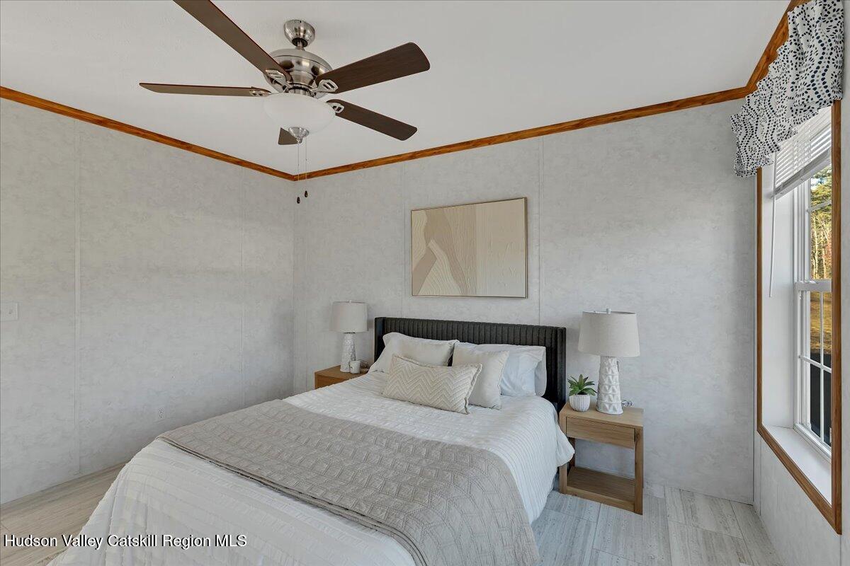 299 Hyspot Road, Unit 4C Greenfield, NY 12833 - Photo 26 of 41 a bedroom with a bed and a window
