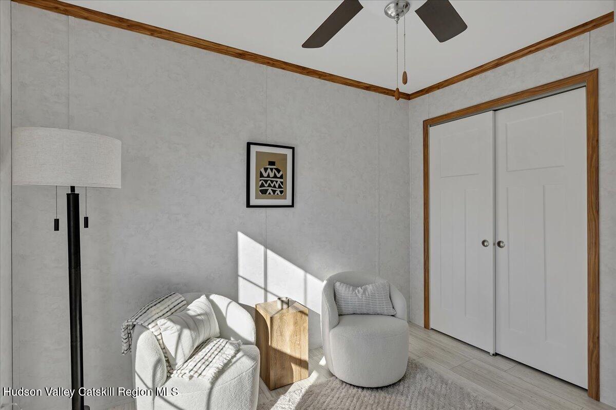 299 Hyspot Road, Unit 4C Greenfield, NY 12833 - Photo 34 of 41 a bedroom with furniture and a bed