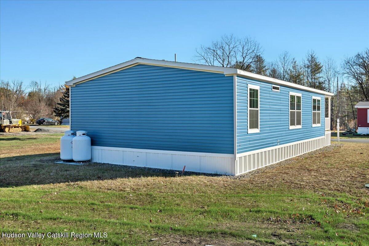 299 Hyspot Road, Unit 4C Greenfield, NY 12833 - Photo 38 of 41 a view of a backyard