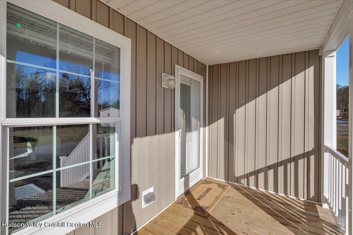 299 Hyspot Road, Unit 4C Greenfield, NY 12833 - Photo 7 of 41 a view of staircase with white walls and windows