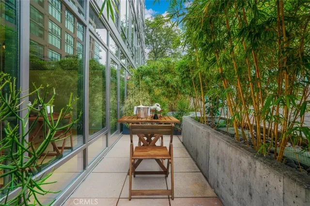 a view of balcony with furniture