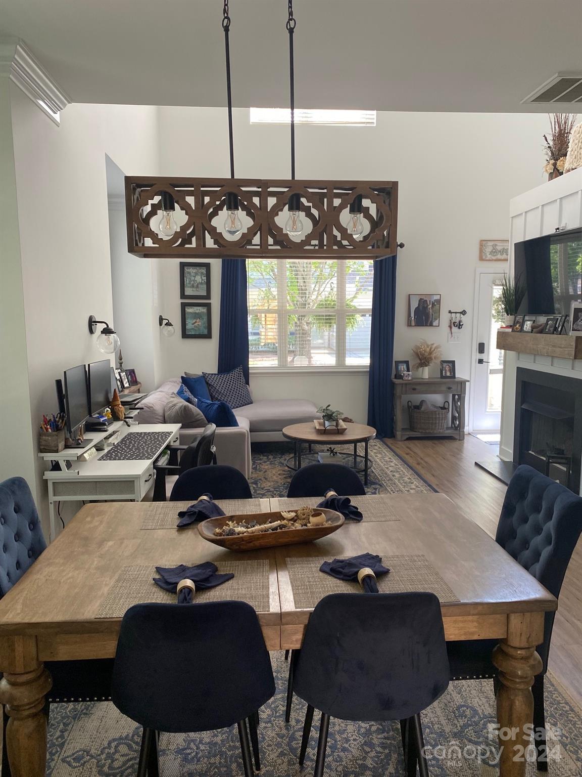18225 Taffrail Way Cornelius, NC 28031 - Photo 11 of 30 a kitchen with a table chairs and a stove
