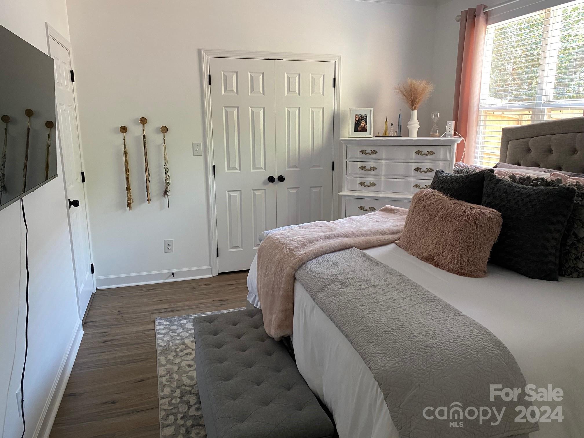 18225 Taffrail Way Cornelius, NC 28031 - Photo 15 of 30 a bedroom with a bed and a window