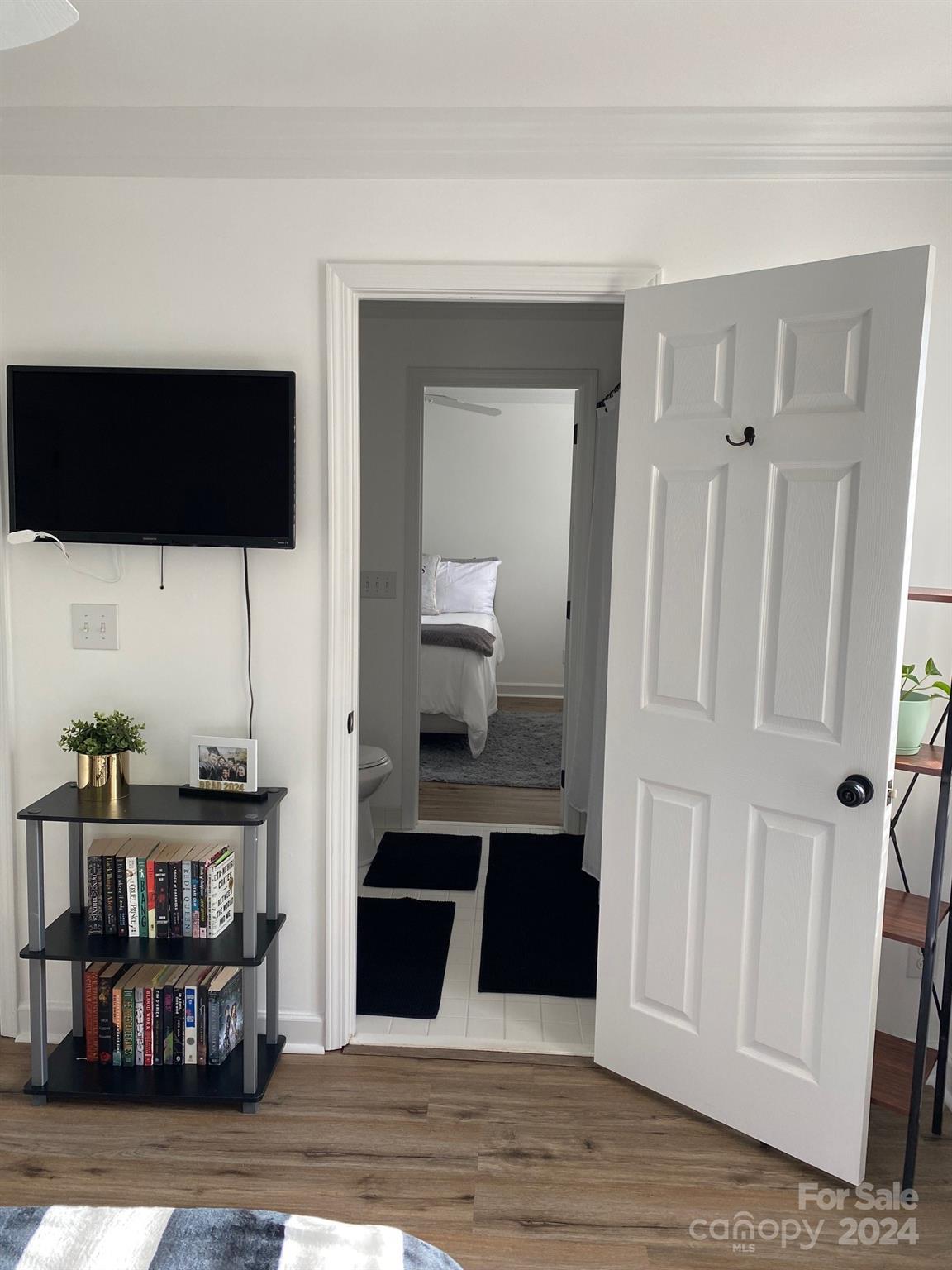 18225 Taffrail Way Cornelius, NC 28031 - Photo 19 of 30 a living room with furniture and a wooden floor