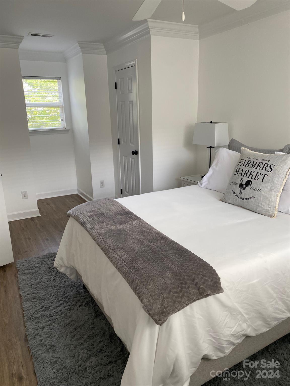 18225 Taffrail Way Cornelius, NC 28031 - Photo 21 of 30 a bedroom with a bed and window