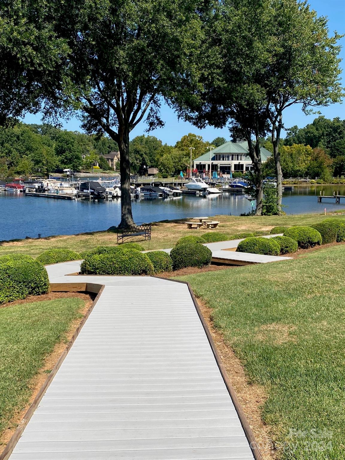 18225 Taffrail Way Cornelius, NC 28031 - Photo 28 of 30 a view of outdoor space with garden and trees