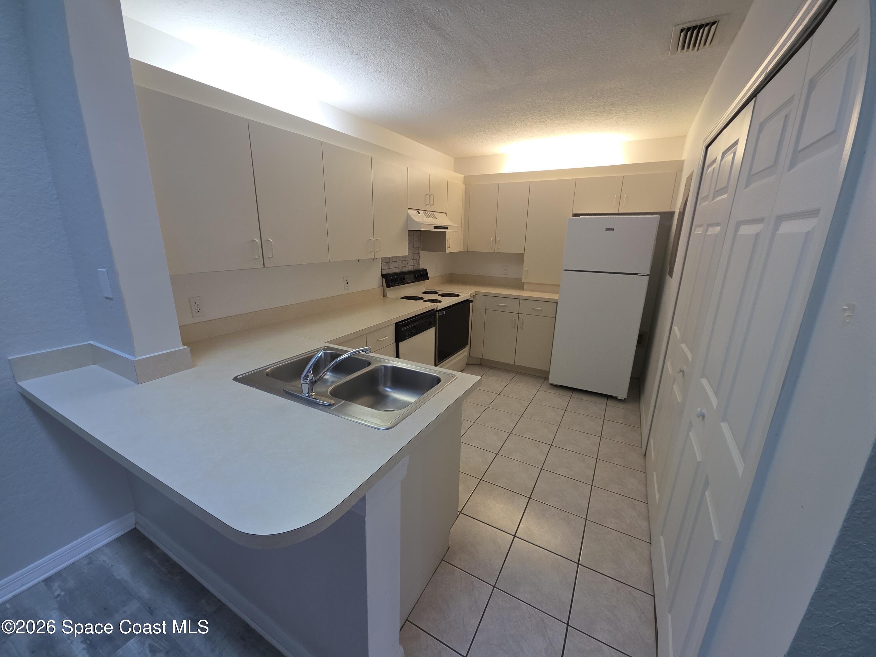 1921 Quail Ridge Court, Unit 2402 Cocoa, FL 32926 - Photo 3 of 5 20260902_105820