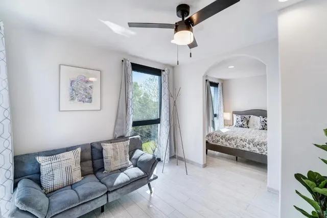 a view of a dining room with furniture window and outside view