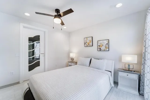 a view of a balcony with furniture