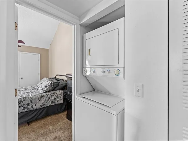 a en suite bathroom with a toilet sink and mirror