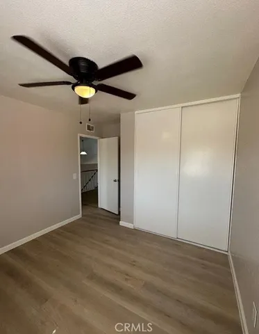 a view of an empty room with a bathroom