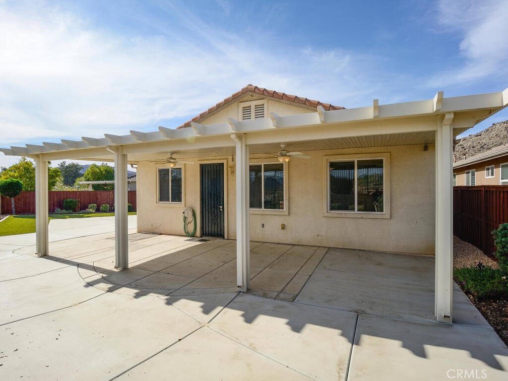 128 Lopez Way Hemet, CA 92545 - Photo 19 of 36 a front view of a house with a porch