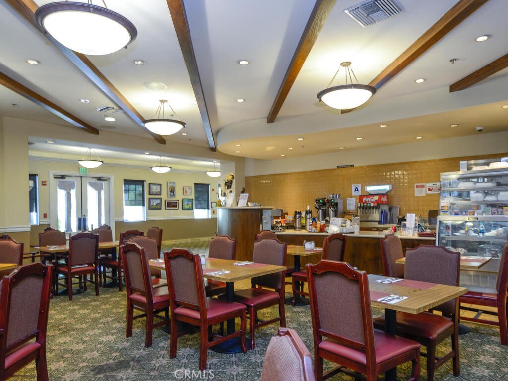 128 Lopez Way Hemet, CA 92545 - Photo 26 of 36 a view of a dining room with furniture