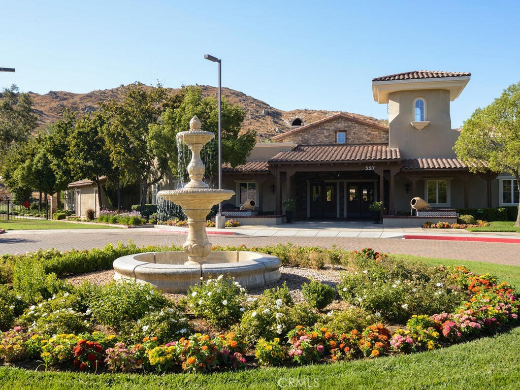 128 Lopez Way Hemet, CA 92545 - Photo 29 of 36 a view of a house with swimming pool and a garden