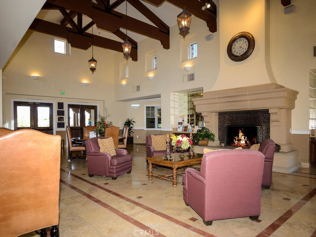 128 Lopez Way Hemet, CA 92545 - Photo 34 of 36 a living room with furniture and a fireplace