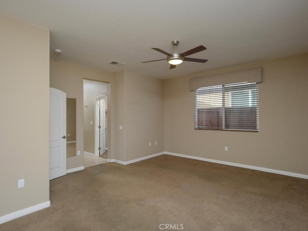 128 Lopez Way Hemet, CA 92545 - Photo 10 of 36 a view of an empty room with a window