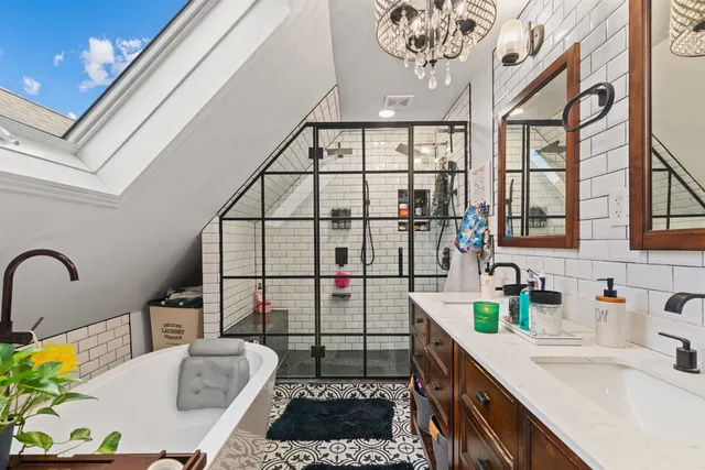 a kitchen with a sink appliances and a dining table