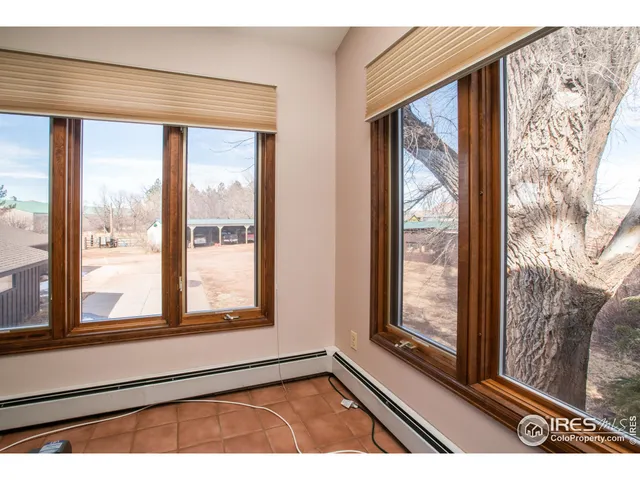 a view of an empty room and window