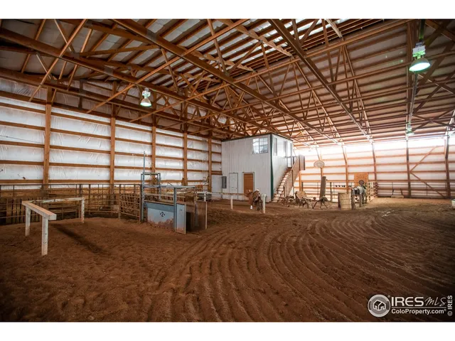 a view of a room with wooden walls