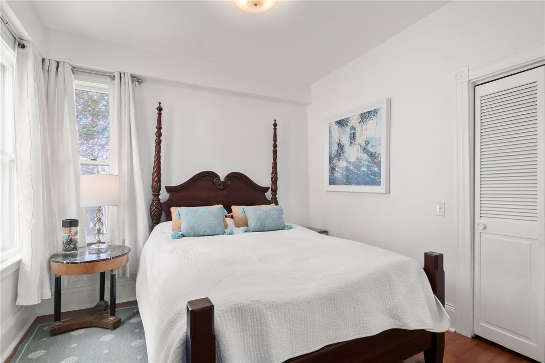 34 Bull Street Newport, RI 02840 - Photo 21 of 23 First floor bedroom with wood flooring and high ceilings