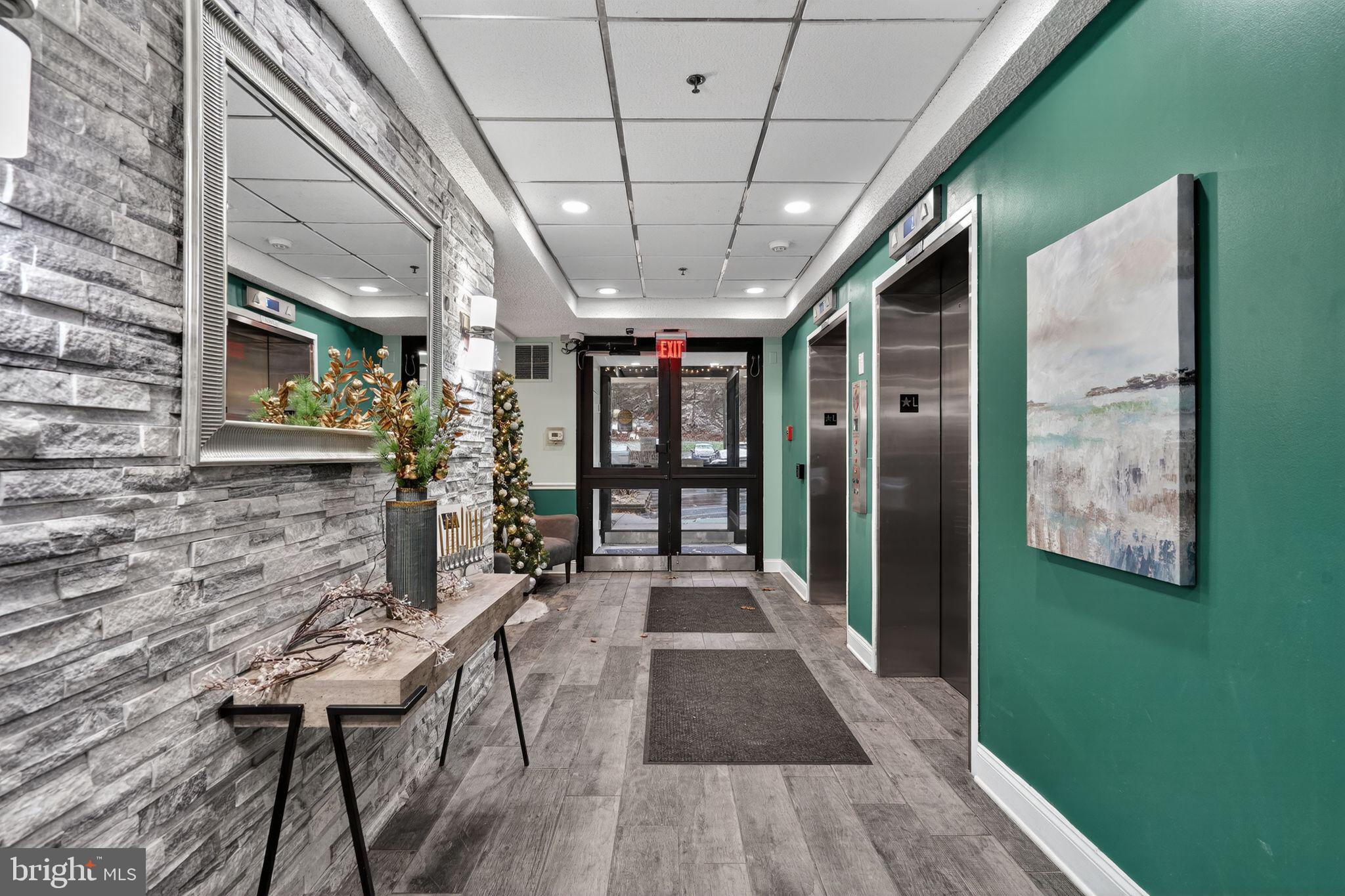 800 Avondale Road, Unit 2C Wallingford, PA 19086 - Photo 3 of 35 First floor lobby area