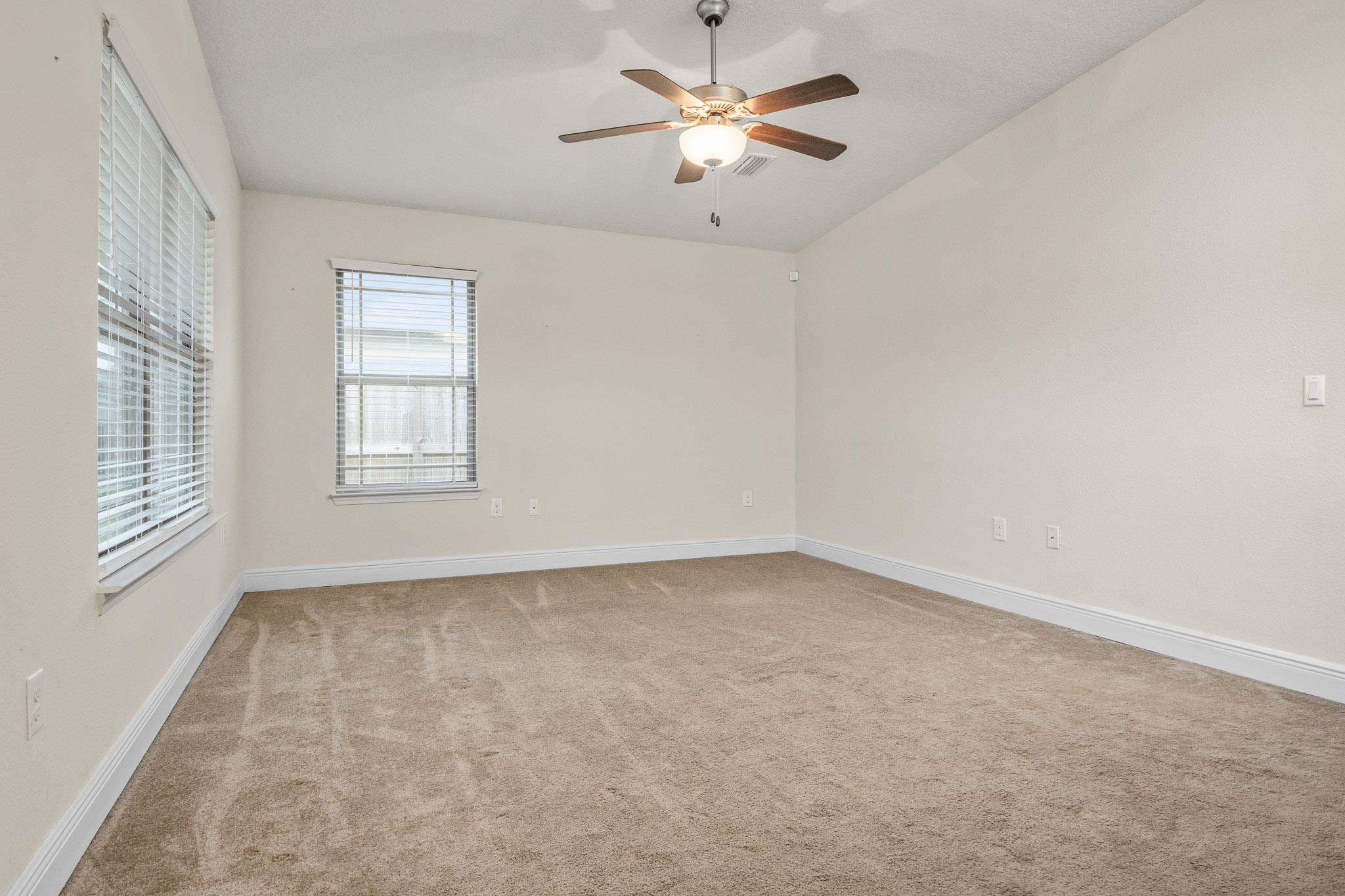 5070 Carmell Ridge Circle Milton, FL 32570 - Photo 3 of 36 a view of an empty room with a window