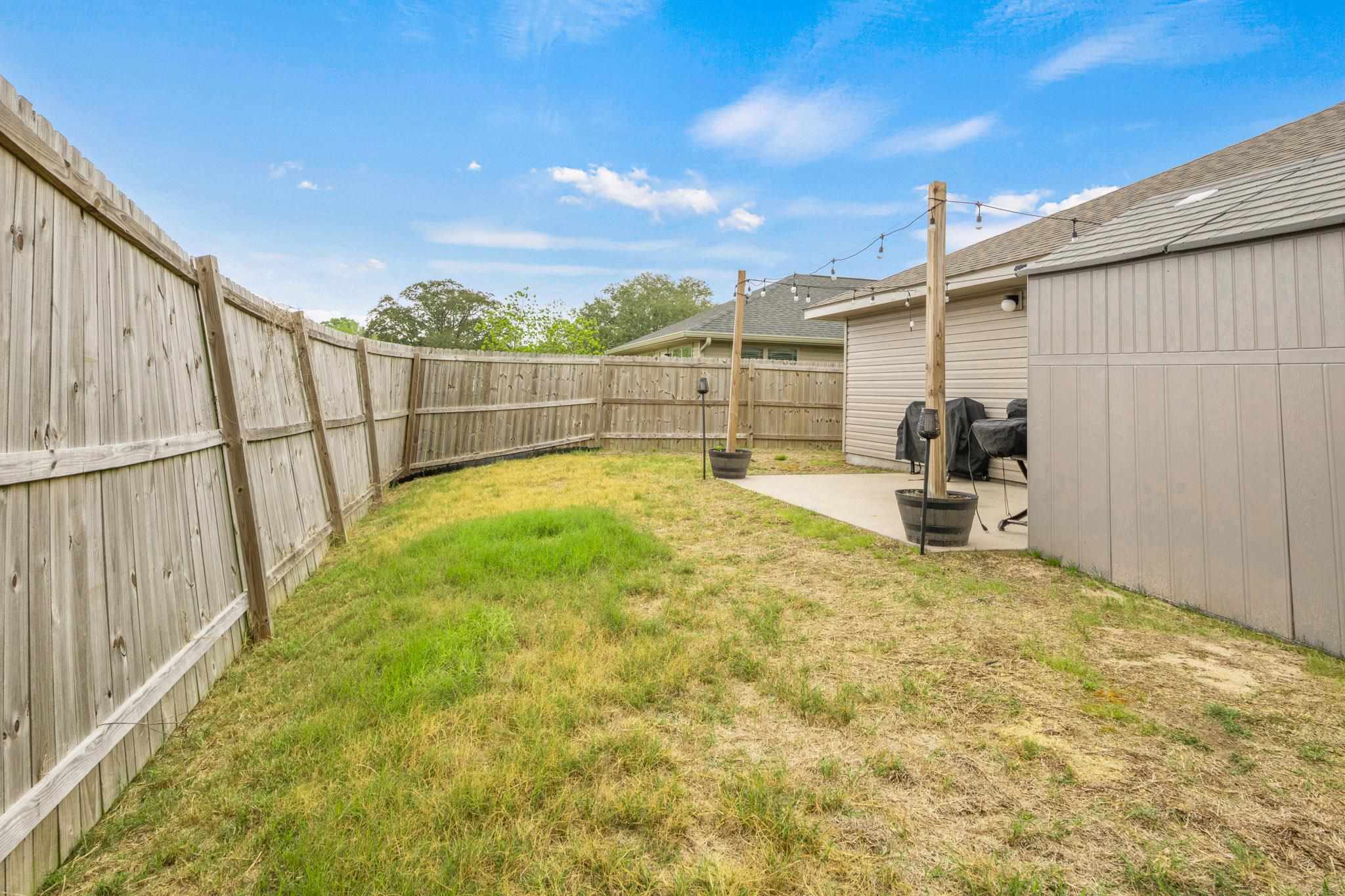 5070 Carmell Ridge Circle Milton, FL 32570 - Photo 35 of 36 a view of a backyard