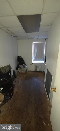 a view of a bathroom with a sink and mirror