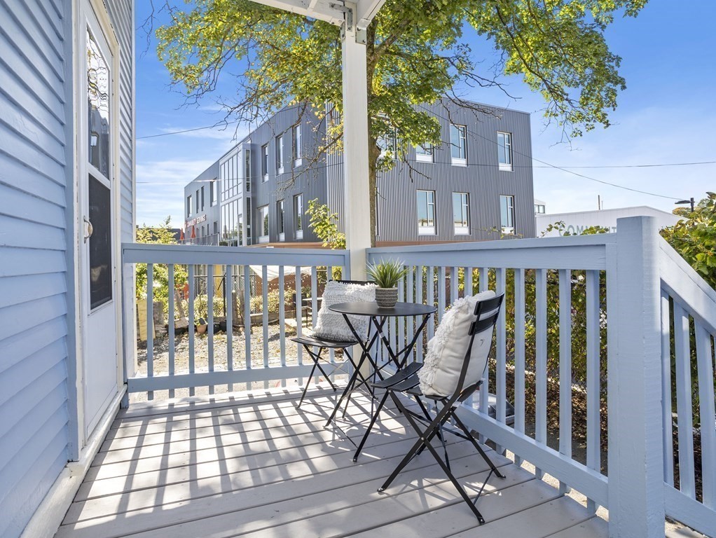 8 Marbury Terrace, Unit 1 Boston, MA 02130 - Photo 23 of 35 a view of a balcony with chairs
