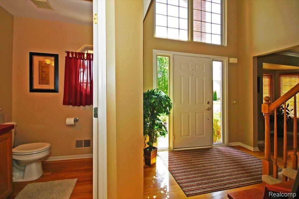 1648 Dunston Road Canton, MI 48188 - Photo 8 of 20 Foyer and Powder Room
