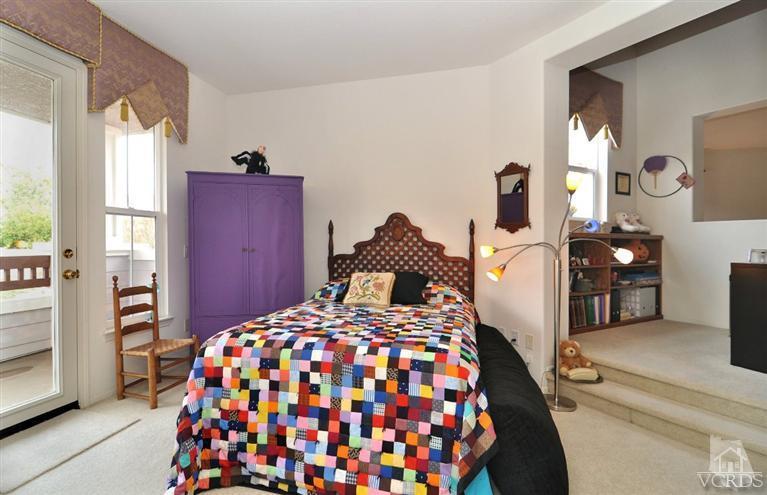 394 Woodland Road Simi Valley, CA 93065 - Photo 22 of 26 a bedroom with a bed and a dresser