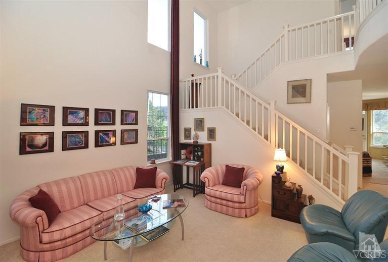 394 Woodland Road Simi Valley, CA 93065 - Photo 5 of 26 a living room with furniture and a book shelf