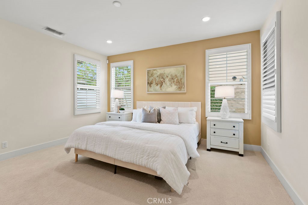 8 Platal Street Rancho Mission Viejo, CA 92694 - Photo 13 of 40 a bedroom with a bed and a window
