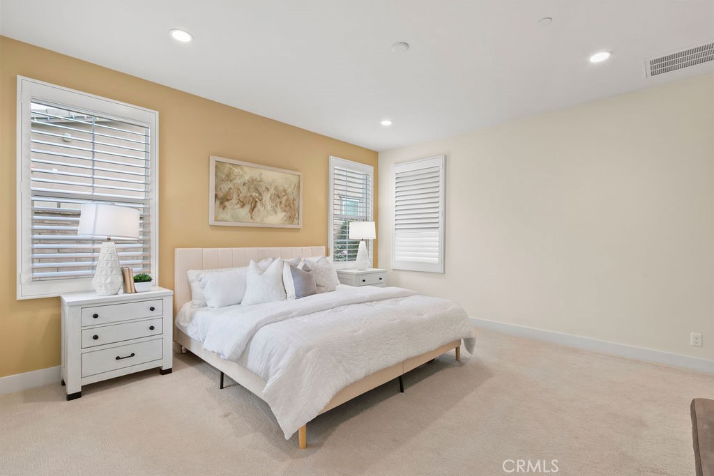 8 Platal Street Rancho Mission Viejo, CA 92694 - Photo 14 of 40 a bedroom with a bed and a window