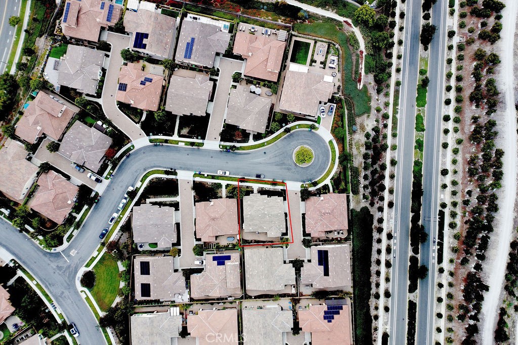 8 Platal Street Rancho Mission Viejo, CA 92694 - Photo 24 of 40 an aerial view of residential house with parking