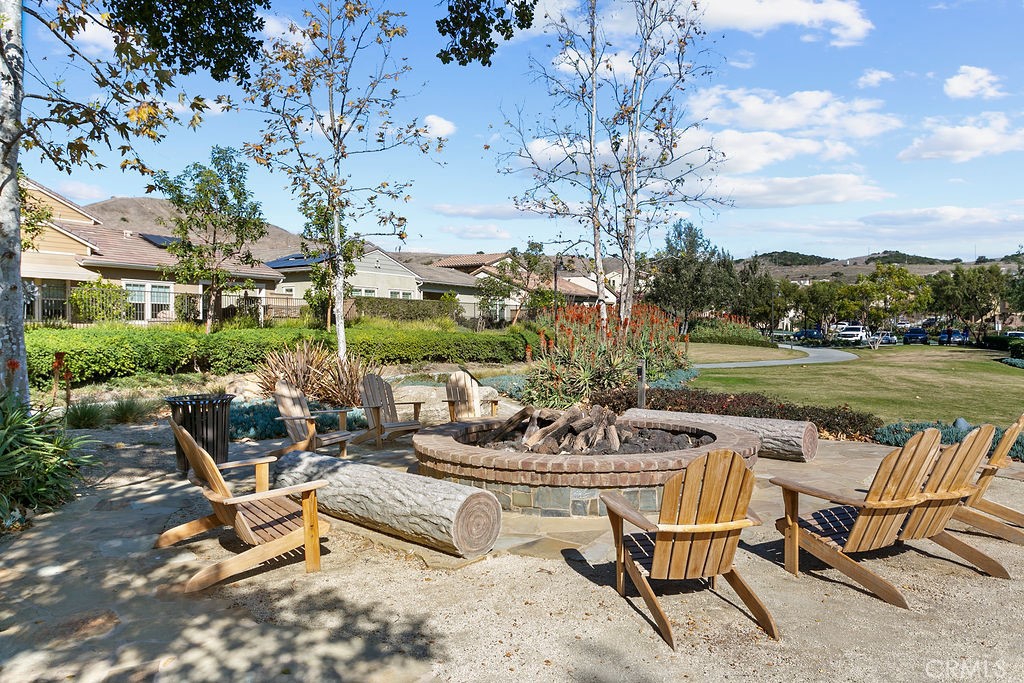 8 Platal Street Rancho Mission Viejo, CA 92694 - Photo 38 of 40 a view of a patio with lawn chairs