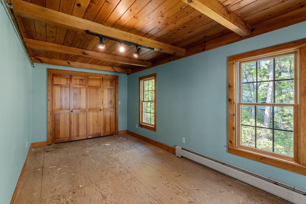 362 Snows Pond Road Rochester, MA 02770 - Photo 24 of 41 a view of an empty room with a window