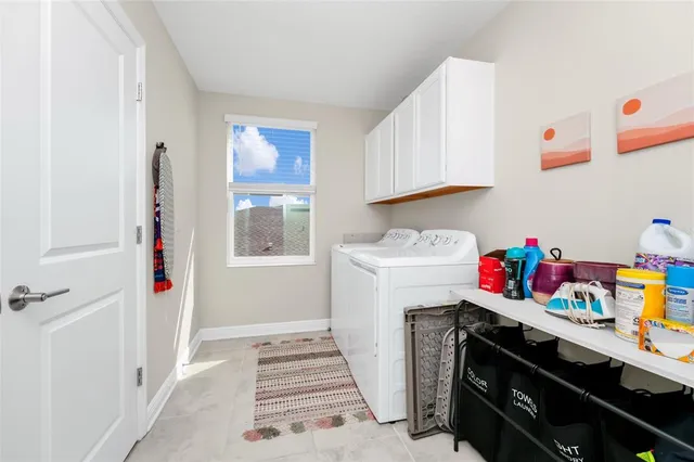 a bedroom with furniture and a table