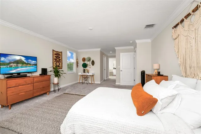 a large bathroom with a sink a large mirror and a bathtub