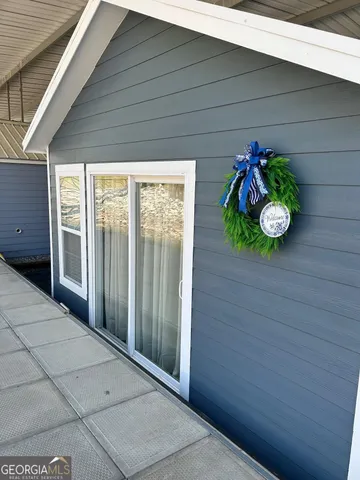 a view of a porch with furniture