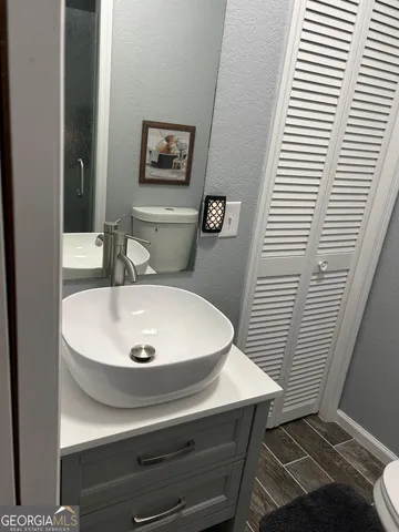 a bathroom with a sink and a mirror
