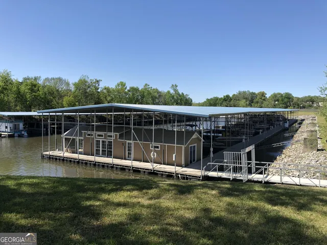 a view of a swimming pool with a garden