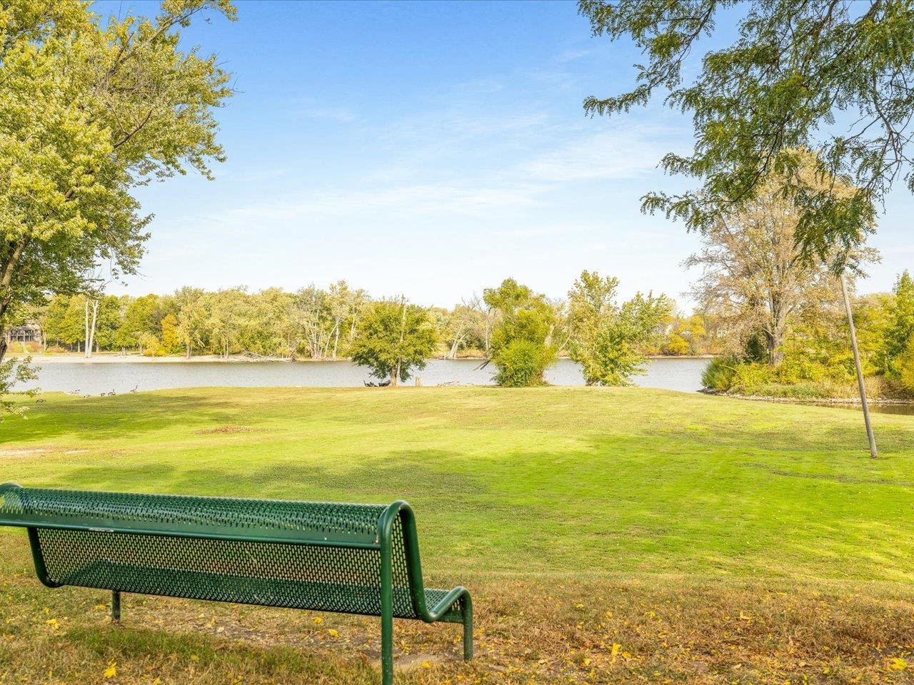334 Northway Park Road Machesney Park, IL 61115 - Photo 1 of 28 a view of an ocean from a beach
