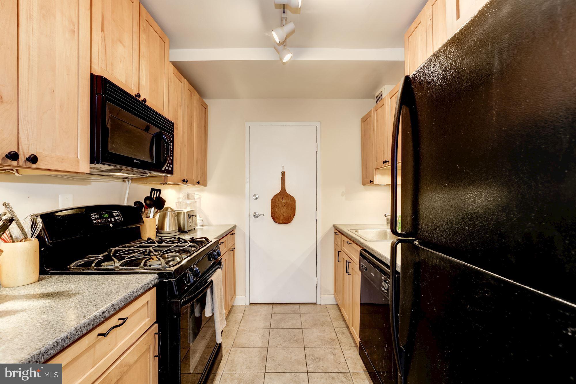 3900 Tunlaw Road Northwest, Unit 613 Washington, DC 20007 - Photo 7 of 20 Updated Kitchen w separate entrance
