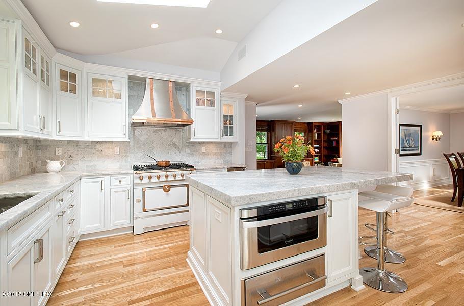 24 Meadow Road Riverside, CT 06878 - Photo 6 of 16 a kitchen with stainless steel appliances granite countertop a stove and a sink